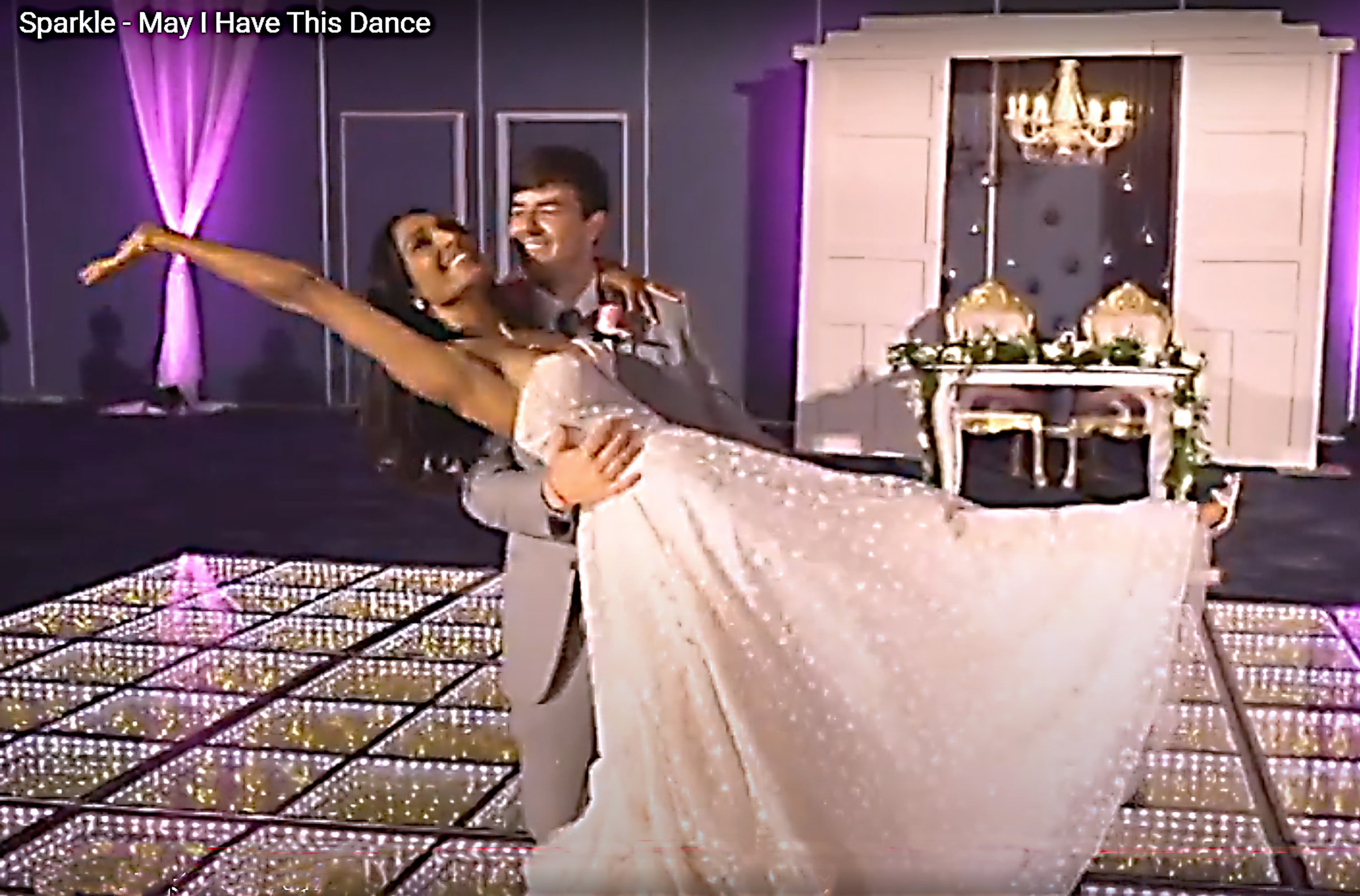 Couple performing a choreographed first dance on a sparkle dance floor in Northern California