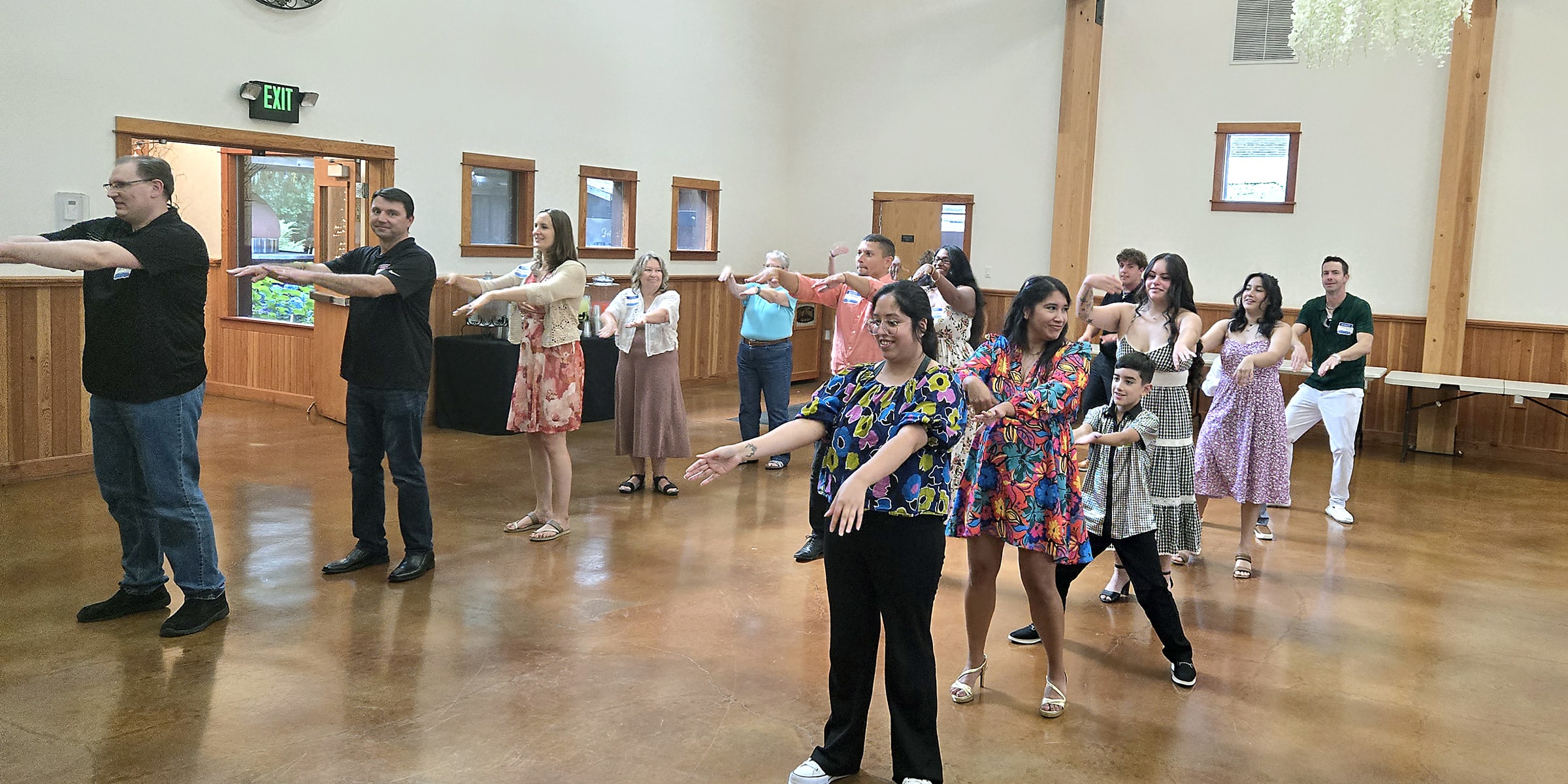 Anniversary party guests doing the Macarena novelty dance in Elmira, Oregon