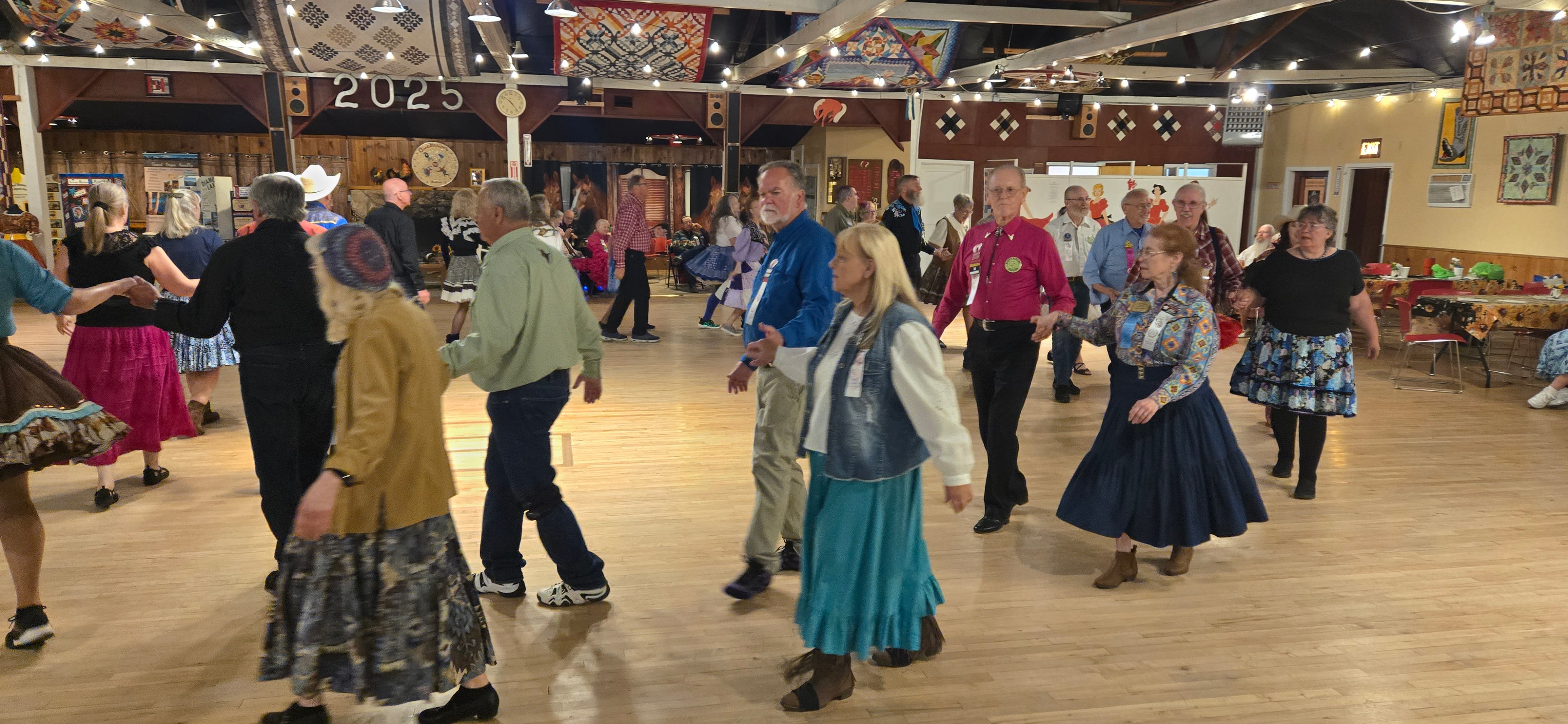 Guests dancing at a barn dance event